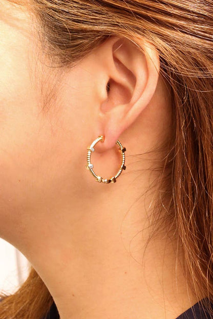 14K Spin Wheel Huggie Earrings: White Gold