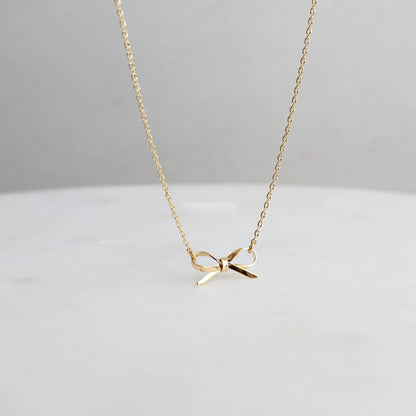 18K STAINLESS STEEL TARNISH FREE BOW NECKLACE: GOLD